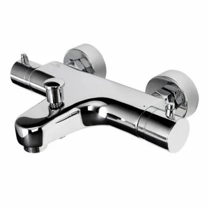 BASIC - Настенный термостатический смеситель для душа для ванны 1/2 '' с восковым термостатическим элементом. Автоматический переключатель. Аэратор "Плюс". Встроенный обратный клапан. Остановка безопасности при 38ºC. Расход бани 20,5 л / мин. и душ 19,5 л