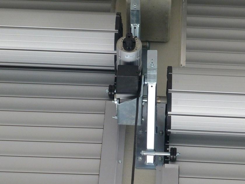 WISNIOWSKI Вертикальная раздвижная дверь Portoni sezionali industriali sun-id-1473992 - Вид №4