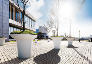 Реконструированный камень круглый высокий плантатор