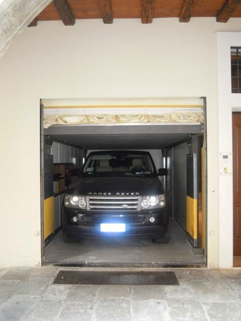 CARMEC Вертикальные раздвижные гаражные ворота с электроприводом Portoni e cancelli sun-id-1378344 - Вид №2