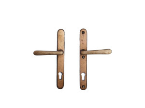 Бронзовая ручка на пластине с насадкой