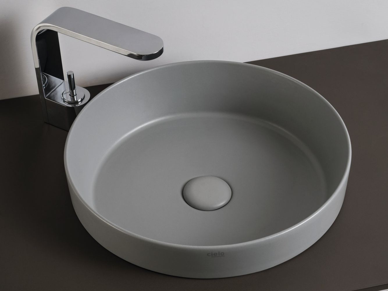 Керамический одиночный круглый полукруглый умывальник Ceramica Cielo ENJOY ARCH-00040934 - Вид №1