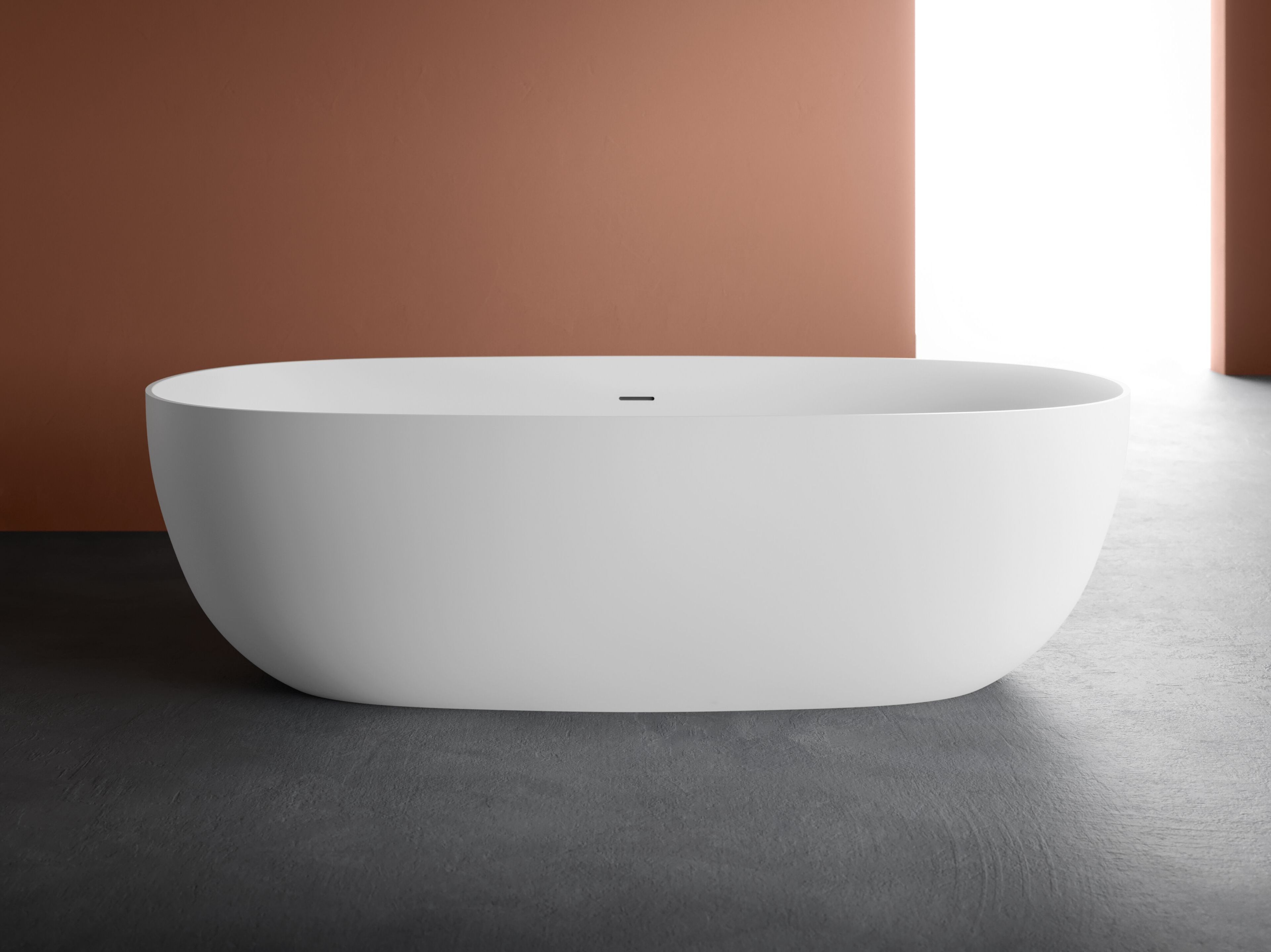 Овальная ванна в центре комнаты в Geablu ARBLU CATINO ARCH-00140381