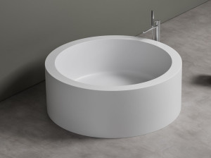 Круглая ванна в центре комнаты Corian®